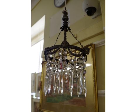 An Adam style electroplated and faceted bead small chandelier,&nbsp;with ram's head masks, 21cm wide.&nbsp; 