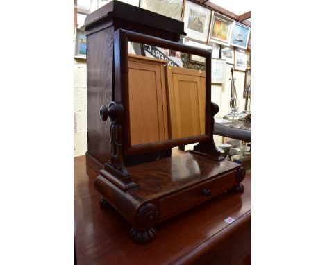 A mid 19th century figured mahogany toilet mirror, the drawer stamped 'Wilkinson, 14 Ludgate Hill', 57cm wide.&nbsp; 