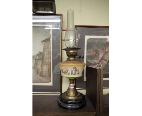 An old oil lamp, the glass reservoir printed with Japanese figures. 