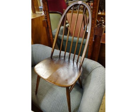 A set of four vintage Ercol dining chairs. 