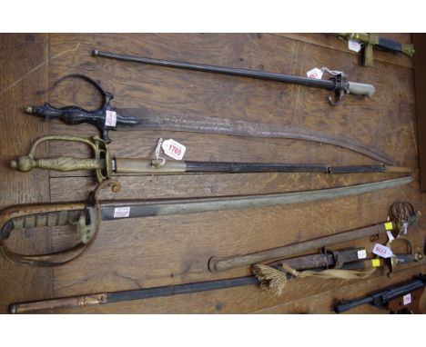 A Victorian cavalry sabre; together with a court sword and scabbard; and an Indian tulwar. (3) 