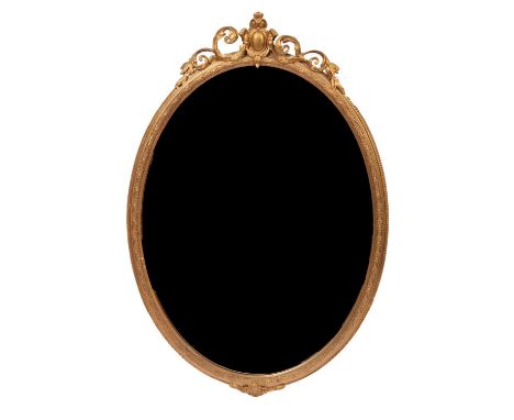 A 19th Century oval gilt wall mirror, within a moulded border surmounted with scroll finial, 119cm x 83cmUpper scrolls with w