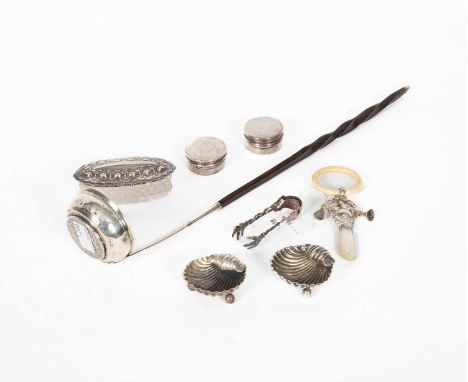 A Georgian silver punch ladle with horn handle, inset with Hispan coin, a pair of silver shell salts, circular trinket boxes,