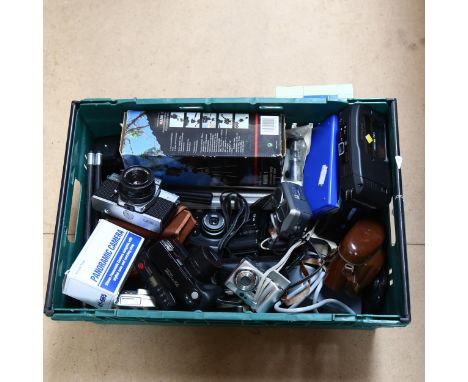 Vintage cameras and accessories, including Polaroid, Nikon and Yashica 