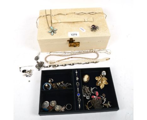 A fitted jewellery box containing assorted collection of silver and enamel jewellery, dress rings, pearl necklaces, brooches 