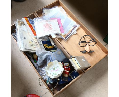 A box containing football memorabilia, a bugle, dolls etc 