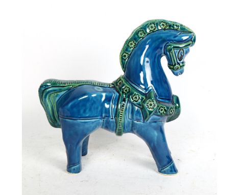 An Italian blue glaze pottery horse, indistinctly signed, height 28cmRear right foot has an underglaze chip, otherwise only v