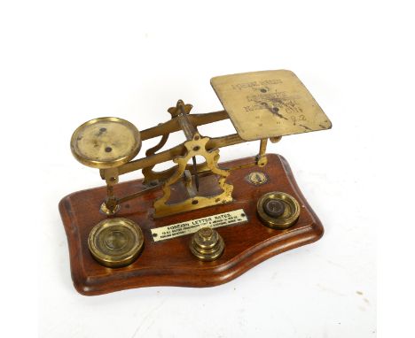 Vintage set of brass postal scales and weights, width 21cm 