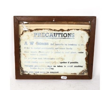A Vintage A W Bombs Precaution enamel sign, 20cm x 30cm, framed 