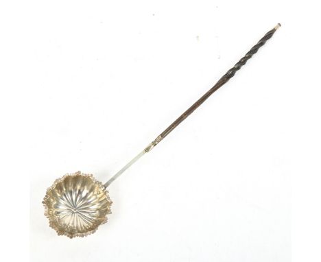 An Antique horn-handled toddy ladle with silver bowl, length 36cm 