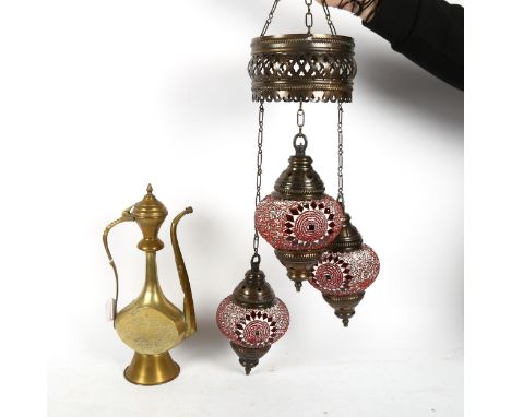 A Middle Eastern hanging light fitting, and an Islamic brass coffee pot 
