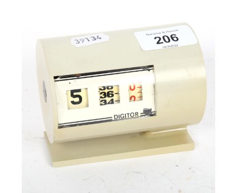 A mid-century Digitor alarm clock, width 10cm 