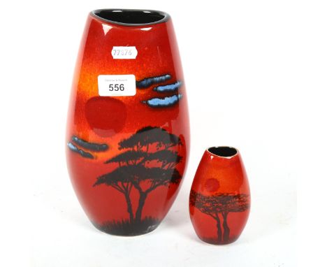 Poole Pottery vase with trees at sunset scene, 25cm, and a similar smaller vase 