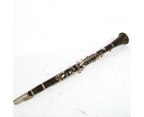 A Chinese Hsinghai 4-section clarinet, in fitted hardshell case 