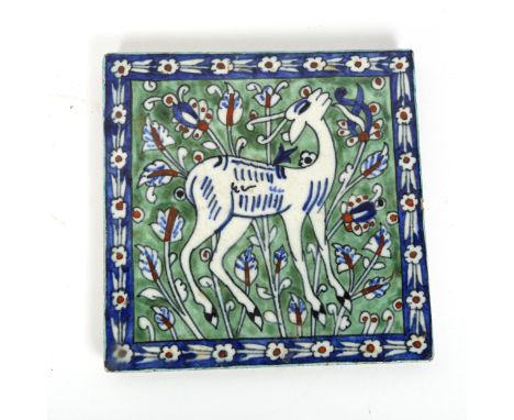 A Turkish hand painted pottery deer tile, 15.5cm x 15.5cmCorners and edges have a few very minor chips 
