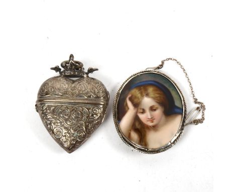 A miniature printed portrait brooch, and an embossed plated heart-shaped photo locket with crown finial 