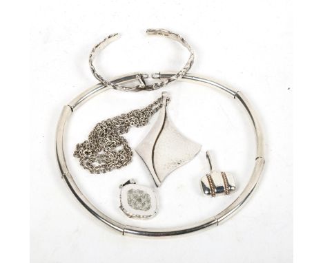 A collection of stylised silver jewellery, to include a bangle, pendant necklace etc 