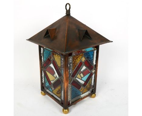 A reproduction copper and stained glass lantern desk lamp, height 45cm, width 28cmNo chips cracks or restoration 