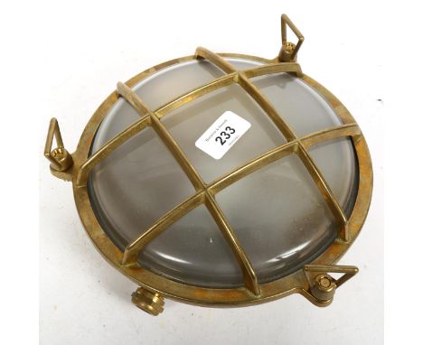 A modern cast-brass bulk-head wall lamp, diameter 23cm 
