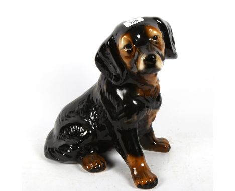 A large ceramic Dachshund dog figure, unmarked, height 36cmNo chips cracks or restoration, only light crazing around paws and