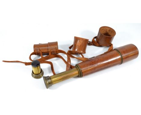 A 2" brass three-draw telescope inscribed 'Reconditioned for John Barker & Co Ltd, Kensington. W.8', by Broadhurst Clarkson &