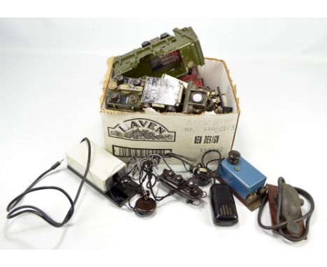 A collection of Morse code devices including an AM military issued example with alphanumeric and response codes to top, anten