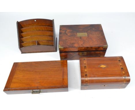 A Victorian walnut and brass detailed writing slope with plaque inscribed 'K. Bedell', width 30cm, also a stationery rack, a 