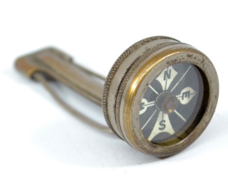 An early to mid-20th century map measuring tool and compass, length 7cm. CONDITION REPORT: Surface wear to outer case with sc