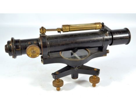 OTTWAY OF EALING; a brass and lacquered theodolite with spirit level above main tube inscribed '1907, W. Ottway & Co, Ealing,