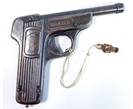 A pre-war German Diana model 1 air pistol with engraved detail of Diana holding aloft a rifle, stamped 'Made in Germany', len