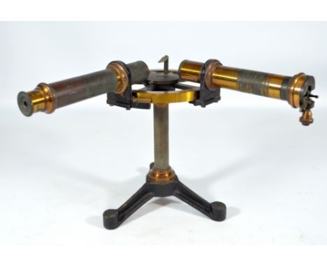 BELLINGHAM & STANLEY LTD OF LONDON; a brass iron and lacquered spectroscope, with delineated five spoke platform and tripod b