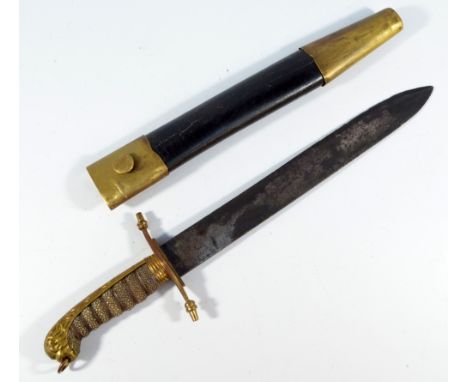 A late 19th century naval dirk, with lion head pommel, shagreen wirework grip and engraved blade in associated scabbard, leng