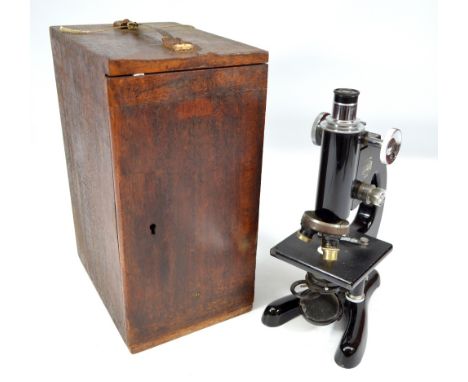 An oak cased Beck model 47 monocular microscope with x10 eye piece, height 31.5cm. CONDITION REPORT: Surface wear to case and