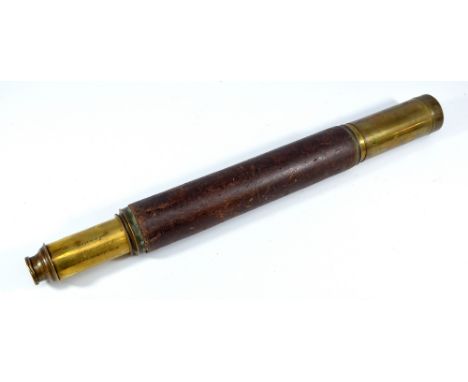WM ASHMORE OF LONDON; a 1.75" 'Day or Night' brass single-draw telescope with leather barrel, length 52.5cm.