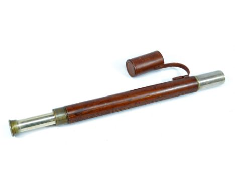 A FRANKS, LTD OF MANCHESTER; a 1.25" nickel plated single-draw telescope with stitched leather barrel and associated protecti