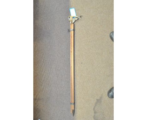 An American WWI period issue oak surveyor's monopod with brass observer's binocular mount, inscribed 'JACOB STAFF AND FIELDGL