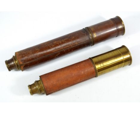 An unnamed 1" brass two-draw telescope with stitched leather body, length 38cm, and a further unnamed brass three-draw telesc