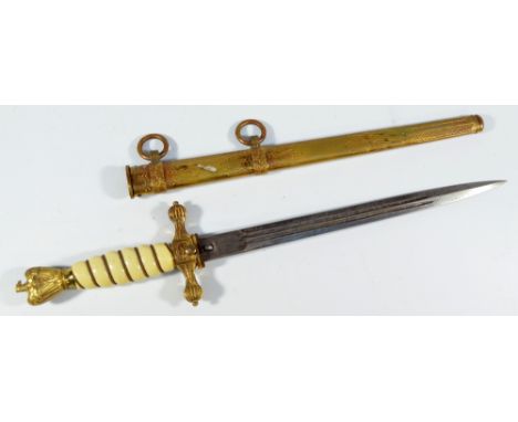 A WWII period German Third Reich Kriegsmarine dagger, with eagle pommel, faux ivory wirework grip and engraved blade inscribe