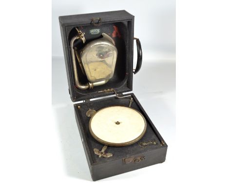 A Decca 22 portable gramophone with amplifying speaker set to the hinged lid and numbered A59954.