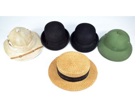 A group of five hats to include two safari type examples, one with internal label for Sing Chao K. Singapore, a straw boater 