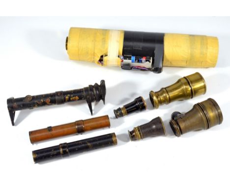 An all brass unnamed single-draw monocular, a further similar example with compass set to the ratchet sidearm, a home-made mo