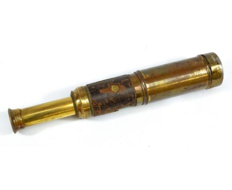 JM BROWEN, 27 MARKET PLACE, MANCHESTER; a 1.25" brass three-draw telescope with part leather and part brass barrel, length 19