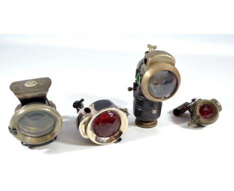 POWELL & HAMMER; four vintage lamps, one with moulded glass side panels set with the company's initials, two with ruby cut gl