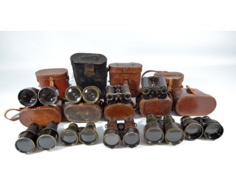 Nine pairs of mixed British binoculars including Negretti & Zambra, Dolland of London, etc (9).