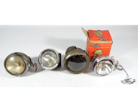 LUCAS; a 'King of The Road' vehicle lamp, a further lamp with indistinct name plate, and a third vehicle lamp with green cut 