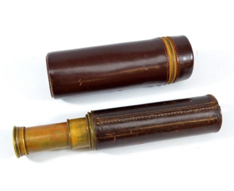 BC&CO; a 1.25" brass 15X three-draw 'Britannic' telescope, with stitched leather barrel and associated outer case, length 16c