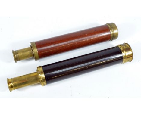 DOLLAND OF LONDON; a distressed brass three-draw telescope with mahogany barrel, length 23.5cm, and a further Dolland of Lond