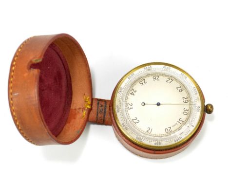 A WWII/Battle of Britain period Air Ministry pocket aneroid barometer, mkI, no.134, the silvered circular dial set with Arabi