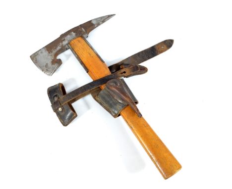 A mid-20th century wooden handled hatchet, the head with rubbed stamp and leather blade protectors, length 40.5cm.