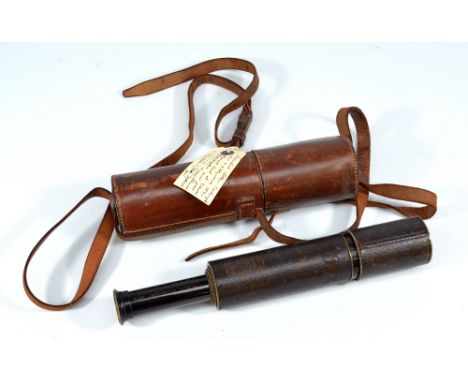 A 1.5" black lacquered four-draw telescope inscribed 'Arthur Cartwright 1873, G.G.P. Heywood 1894', in leather case.